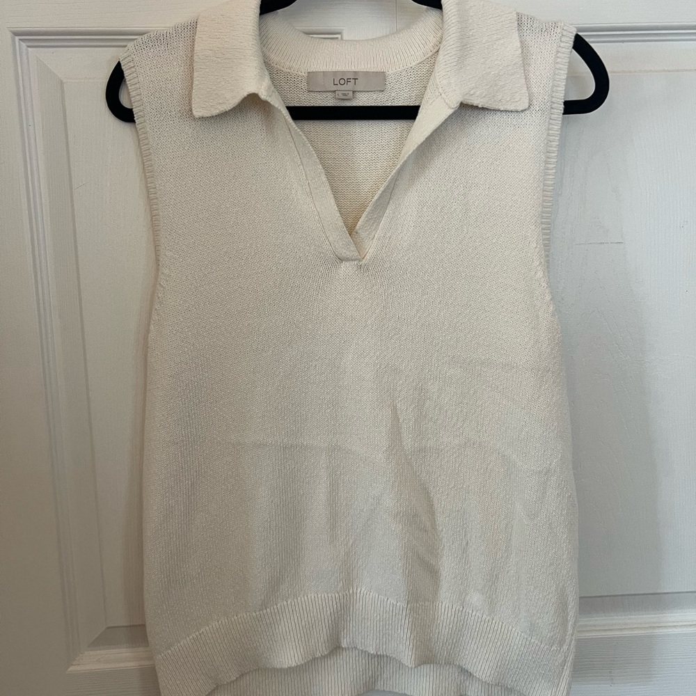 Cream sleeveless sweater vest